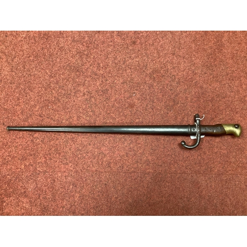 333 - XIX Century French Model 1874 Gras Bayonet and Scabbard, bayonet manufacturer mark 'Mre d'armes de S... 