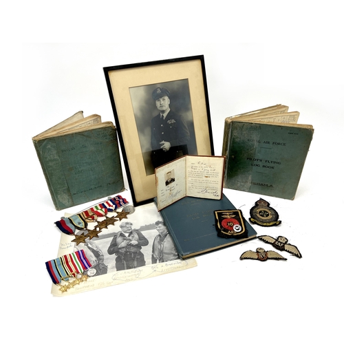 480 - WWII RAF Fighter Command Air Crew Europe Star Medal and Log Book Grouping, plus cloth insignia, phot... 