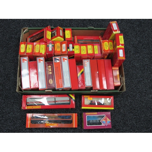 801 - Approximately Thirty Six OO Gauge Rolling Stock Items mostly by Hornby, boxed.