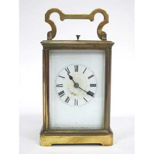 1010 - An Early XX Century Brass Cased Carriage Clock, the white enamel dial with Roman numerals, 13cm high... 