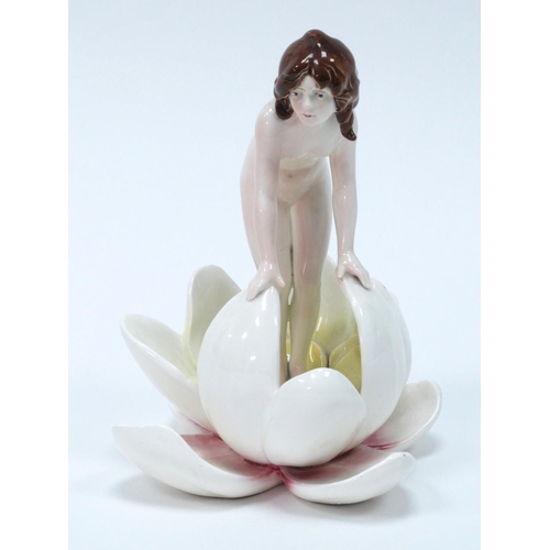 1162 - An Early XX Century Pottery Figure of a Nymph, standing in a lily pad, unmarked, 17.5cm high.