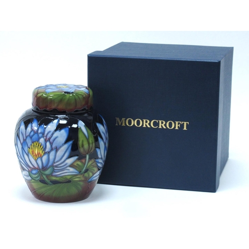 1164 - A Moorcroft Pottery Ginger Jar and Cover, of ovoid form, painted in the 'Blue Lotus' pattern, impres... 