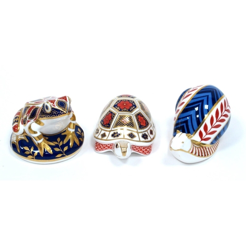 1169 - Three Royal Crown Derby Porcelain Paperweights, 'Turtle', 'Snail' and 'Frog', gold and moulded stopp... 