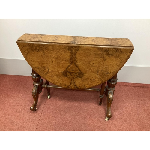 1527 - A XIX Century Walnut Sutherland Table, with drop leaves, turned and reeded supports on cabriole legs... 