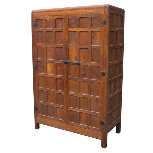 1535 - A 1930's Robert 'Mouseman' Thompson Oak Two Door Wardrobe, with arcaded frieze, adzed panelled doors... 