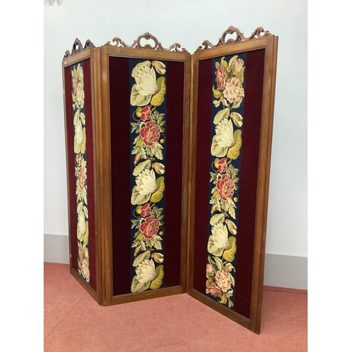 1538 - A XIX Century Walnut Three-Fold Screen, with 'C' scroll applied top over woolwork panels of flowers,... 