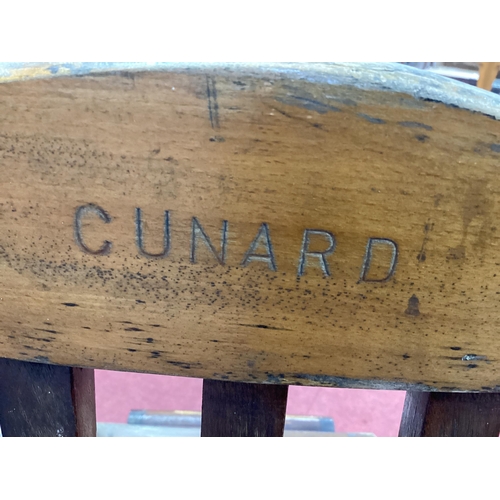 1539 - An Early XX Century Cunard Teak Folding Steamer Deck Chair, with caned seat, stamped 