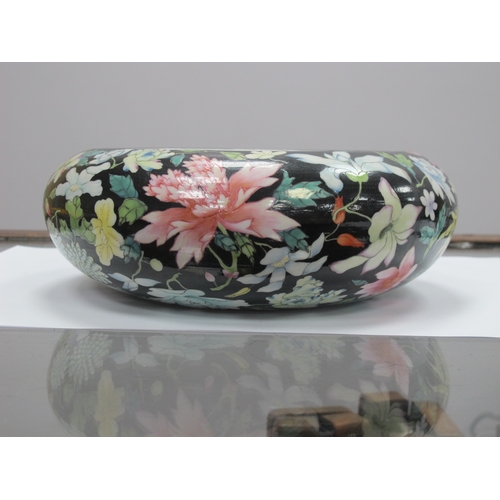 1193 - An Early XX Century Chinese Swallow Circular Bowl, decorated with colourful flowers against a black ... 