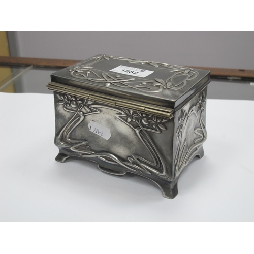 1282 - A Moritz Hacker Art Nouveau Pewter Trinket Box, of footed rectangular form with hinged lid, cast wit... 