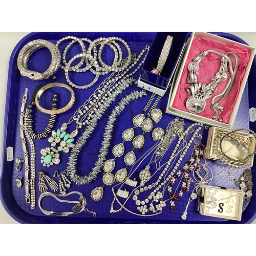 24 - An Assortment of Diamanté Jewellery, to include necklace and earring set, wrap-round snake bracelet,... 