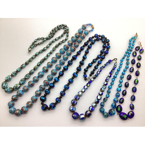 3 - A Collection of Glass Bead Necklaces, to include wedding cake pattern, foiled beads, rolled gold wir... 