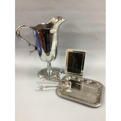 6 - A Pedestal Plated Jug, with scroll handle, on oval base; London Houses of Parliament souvenir tea tr... 