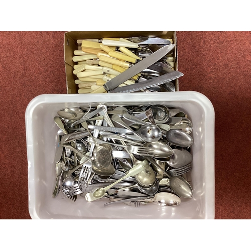 60 - A Large Mixed Lot of Assorted Plated and Stainless Steel Cutlery, ivorine handled etc :- Two Boxes