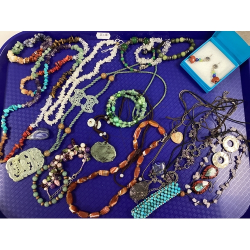 14 - A Collection of Hardstone Jewellery, to include carved pendants, multi-stone necklace and matching b... 