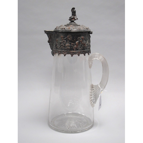 21 - Elkington & Co; A Victorian Plated on Copper Mounted Glass Water Jug, detailed in relief with cherub... 