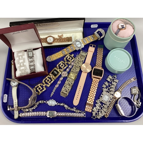 28 - An Assortment of Modern Ladies Wristwatches, to include Radley, Monte Carlo wristwatch and diamanté ... 