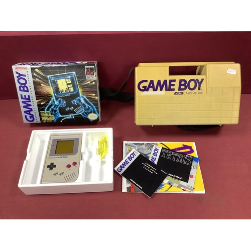 668 - An Original Circa 1989 Nintendo Game Boy Compact Video Game System, Tetris game cartridge, literatur... 