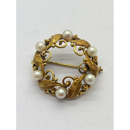 200 - WITHDRAWN An Ornately Decorated Pearl Bead Brooch, of openwork foliate design, stamped 