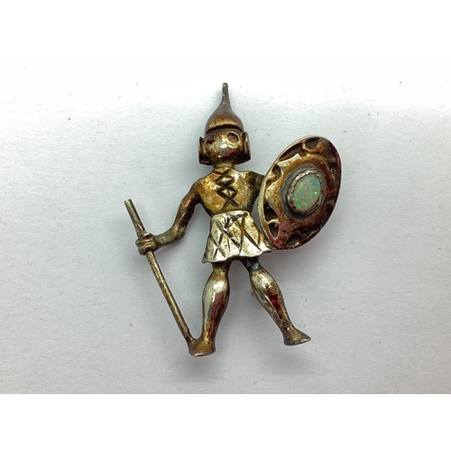 201 - A Scandinavian Style Opal Inlaid Warrior Brooch, (axe not intact, one eye stone missing), stamped 