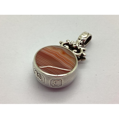 202 - David Scott Walker; A Hallmarked Silver and Banded Agate Circular Fob Pendant, collet set bearing fe... 