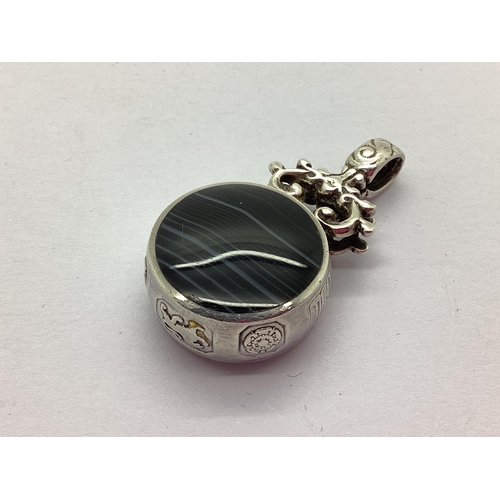 202 - David Scott Walker; A Hallmarked Silver and Banded Agate Circular Fob Pendant, collet set bearing fe... 