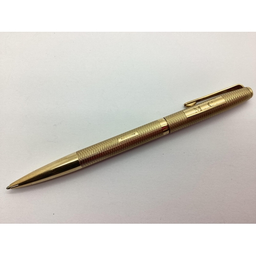 301 - A 9ct Gold Yard-O-Led Ballpoint Pen, allover engine turned decoration, personalised 'M.C.' (EB, Birm... 