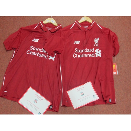 428 - Liverpool Home Shirts by New Balance Bearing Standard Charted Logo, both size M, signed by Fabinho a... 