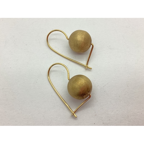 59 - A Pair of 9ct Gold Drop Earrings, the shaped stems to brushed spherical design (3grams).