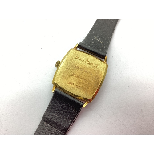 116 - Pontiac; A 1970's Memodate Gent's Wristwatch, the signed cushion shape dial with block markers, cent... 