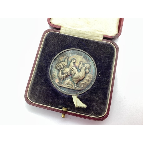 25 - A Hallmarked Silver 'The Poultry Club' Medallion, founded 1877, with vacant cartouche, within origin... 