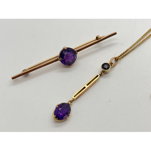 60 - An Edwardian Amethyst Set Drop Pendant, oval claw set below pierced bar and collet set surmount, on ... 