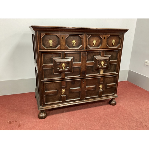 1521 - A XVII Century Oak Chest of Drawers, the two short and two long drawers with moulding on bun feet, 1... 
