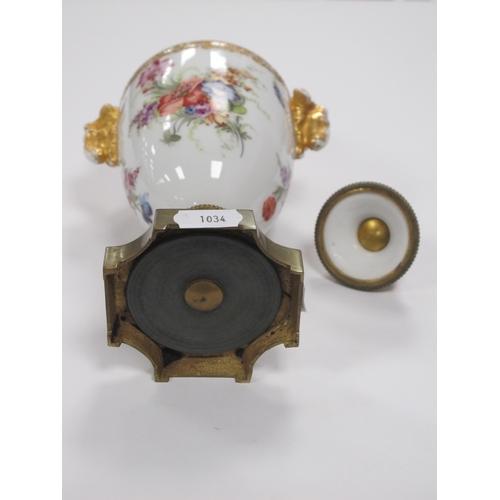 1034 - A Berlin Porcelain Circular Bowl and Cover, with kneeling cherub finial, moulded with bands of baske... 