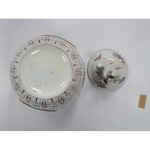 1034 - A Berlin Porcelain Circular Bowl and Cover, with kneeling cherub finial, moulded with bands of baske... 