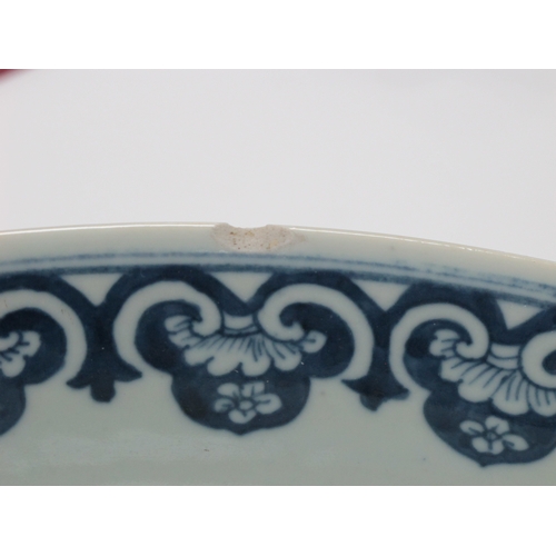 1121 - A Late XIX Century Large Chinese Pottery Circular Bowl, painted in blue with a central dragon chasin... 