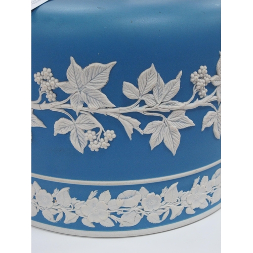 1043 - A Late XIX Century Pottery Blue Jasper Ware Cheese Dome and Cover, applied in white with berries, fl... 
