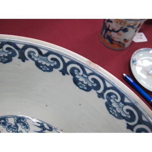 1121 - A Late XIX Century Large Chinese Pottery Circular Bowl, painted in blue with a central dragon chasin... 