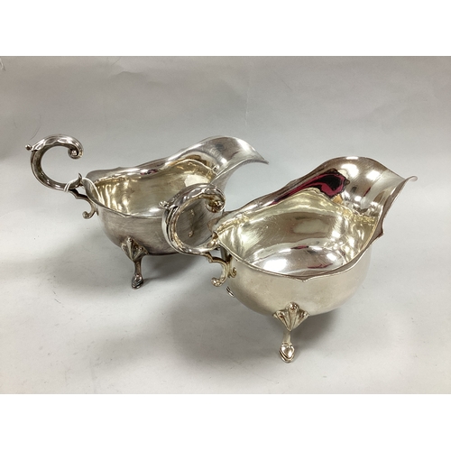 195 - A Pair of James Dixon & Sons Plated Sauce Boats, each with wavy cut edge and leaf capped flying scro... 