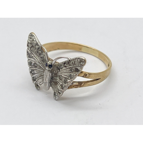 29 - A 9ct Gold Diamond Butterfly Ring, sapphire set eyes between bifurcated band (finger size M) (2.5gra... 