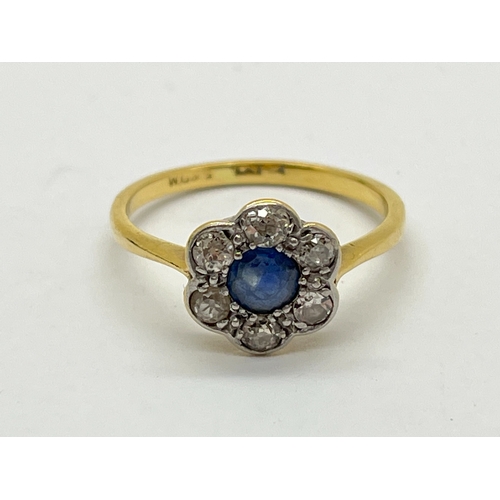 46 - A Vintage Sapphire and Diamond Flowerhead Cluster Ring, millegrain set with old cut stones, indistin... 