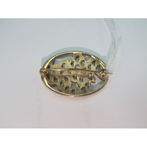 78 - A 9ct Gold Modernist Style Oval Brooch, of openwork design, semi textured finish (7grams).