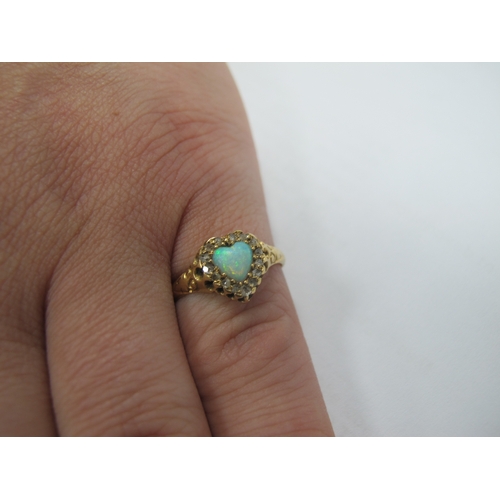 35 - A Victorian 18ct Gold Opal and Diamond Heart-Shaped Ring, (Birmingham 1898), the collet set open wit... 