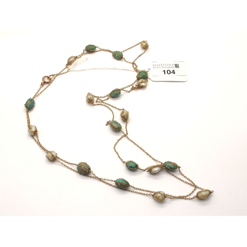 104 - Murrle Bennett & Co; An Arts & Crafts Baroque Pearl and Turquoise Long Chain, to rose colour bolt ri... 