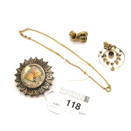 118 - An Edwardian Openwork Pendant, circular collet set with tied bow surmount, stamped 