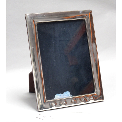 18 - A Modern Hallmarked Silver Mounted Rectangular Photograph Frame, RC 925, Sheffield 2000, bearing fea... 