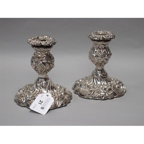 21 - A Pair of Antique Hallmarked Silver Dwarf Candlesticks, Sheffield 1891, of highly decorative relief ... 