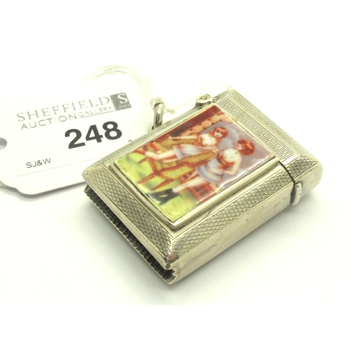 248 - A Hallmarked Silver Vesta Case, HJC, Birmingham 1924, with a risqué enamel panel, depicting two scan... 