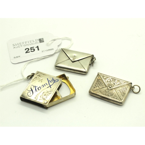 251 - A Hallmarked Silver 'Stamps' Case, C&N, Birmingham 1914, highlighted in enamel (loss), swivelling de... 