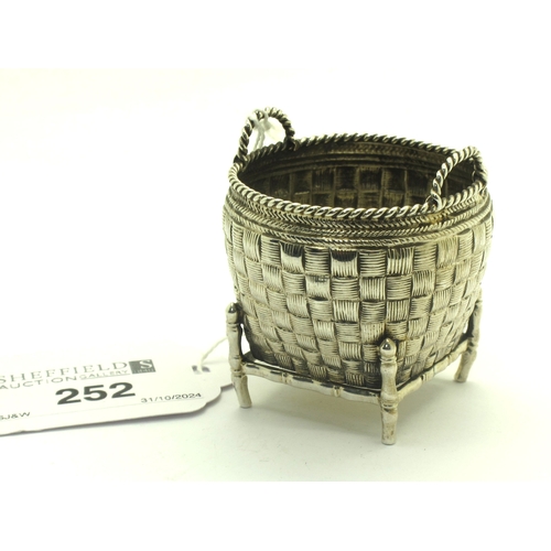 252 - A Chinese Miniature Basket, of textured finish with twisted twin handles, raised on four feet, stamp... 