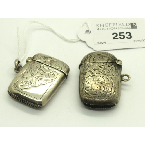 253 - A Hallmarked Silver Vesta Case, Birmingham 1902, allover engraved decoration, 4.2cm; Together with A... 